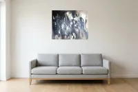 Tableau Abstrait Noir 199 “Fusion”, peinture originale à l'huile par Régine Gardan, 80 × 65 cm, tableau noir accroché dans un salon