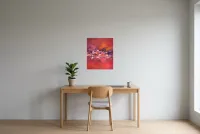 Tableau Abstrait Rouge 219 “Intensité”, peinture originale à l'huile par Régine Gardan, 46 × 55 cm, tableau rouge accroché dans un bureau