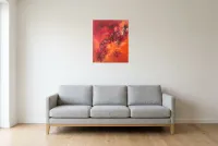 Tableau Abstrait Rouge 25 “Énergie”, peinture originale à l'huile par Régine Gardan, 50 × 60 cm, tableau rouge accroché dans un salon