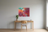 Tableau Abstrait Rouge 27 “Plénitude”, peinture originale à l'huile par Régine Gardan, 80 × 65 cm, tableau rouge accroché dans un bureau